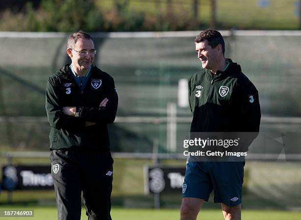 Manager Martin O'Neill and assistant manager Roy Keane of Republic of Ireland chat during a training session at Gannon Park on November 12, 2013 in...