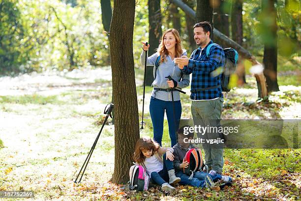 family making break at hiking. - cell signaling pathway stock pictures, royalty-free photos & images