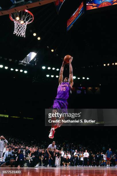 Vince Carter of the Toronto Raptors dunks the ball during the 2000 NBA All Star Slam Dunk Contest at The Arena In Oakland on February 12, 2000 in...