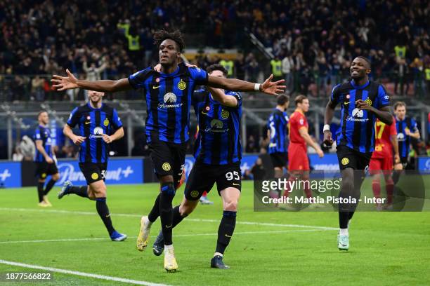 Yann Aurel Bisseck of FC Internazionale celebrates after scoring his team's first goal with teammate Alessandro Bastoni during the Serie A TIM match...