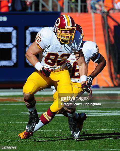 Logan Paulsen of the Washington Redskins blocks against the Denver Broncos at Sports Authority Field on October 27, 2013 in Denver, Colorado.