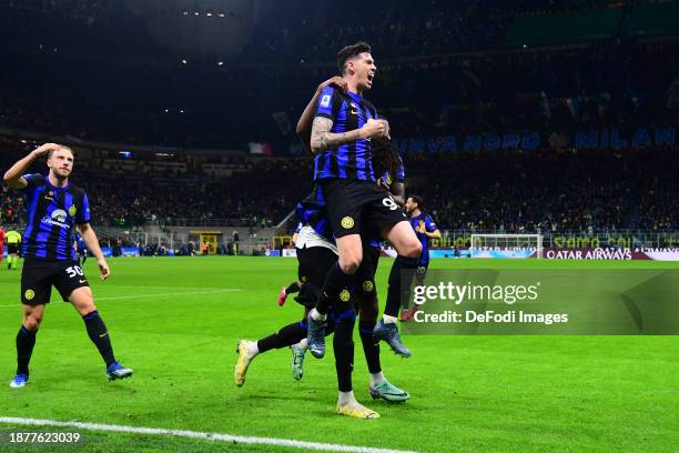 Yann Aurel Bisseck of of FC Internazionale celebrates after scoring his team's first goal with team mates during the Serie A TIM match between FC...