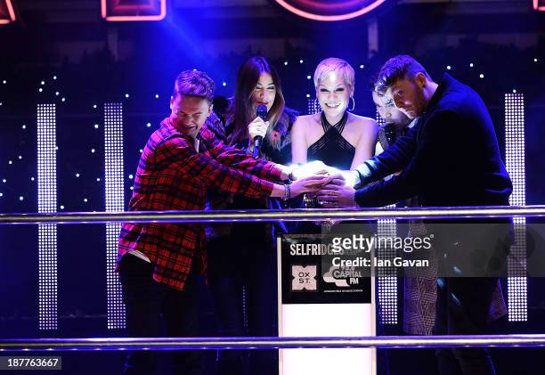 Best selling artist Jessie J switches on the Oxford Street Christmas lights at Selfridges with James Arthur and Conor Maynard to crowd 10,000 on...