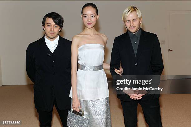 Creatures of the Wind's Shane Gabier and Chris Peters pose with model Fei Fei Sun at CFDA and Vogue 2013 Fashion Fund Finalists Celebration at Spring...