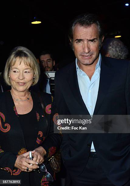 Jean Dujardin and Martine Monteil attend the Quai Des Orfevres 2014 Literary Prize award announcement at the Police Judiciaire on November 12, 2013...