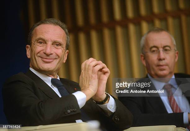 Electricite de France CEO Henri Proglio and Areva CEO Luc Oursel pause during a press conference about nuclear energy on the international market on...