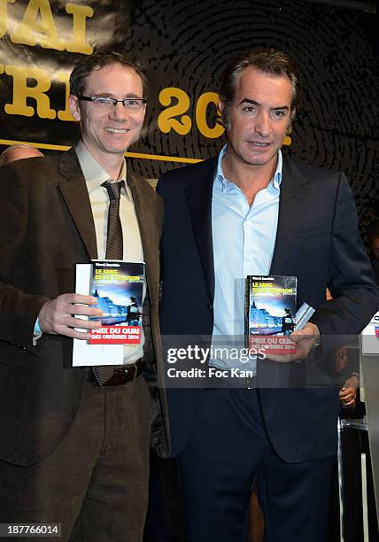 Herve Jourdain, Quai Des Orfevres 2014 award winner for his book 'Le Sang De La Trahison' , and Jean Dujardin attend the Quai Des Orfevres 2014...