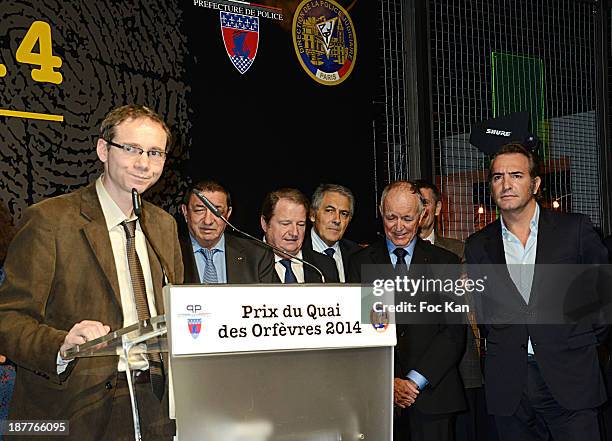 Herve Jourdain, Quai Des Orfevres 2014 award winner for his book 'Le Sang De La Trahison' and Jean Dujardin attend the Quai Des Orfevres 2014...