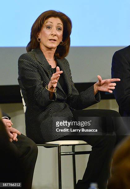 Faiza Saeed participates in a panel discussion during the New York Times 2013 DealBook Conference in New York at the New York Times Building on...