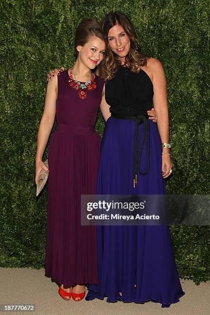 Irene Neuwirth poses with a guest at CFDA and Vogue 2013 Fashion Fund Finalists Celebration at Spring Studios on November 11, 2013 in New York City.