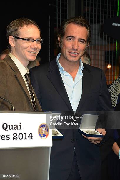 Herve Jourdain, Quai Des Orfevres 2014 award winner for his book 'Le Sang De La Trahison' and Jean Dujardin attend the Quai Des Orfevres 2014...