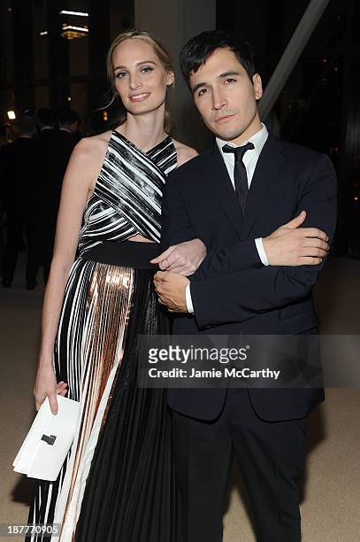 Proenza Schouler's Lazaro Hernandez poses with Lauren Santo Domingo at CFDA and Vogue 2013 Fashion Fund Finalists Celebration at Spring Studios on...