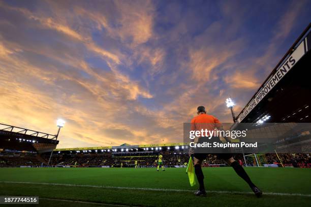 General view as an Assistant Referee is seen at sunset during the Sky Bet Championship match between Norwich City and Huddersfield Town at Carrow...