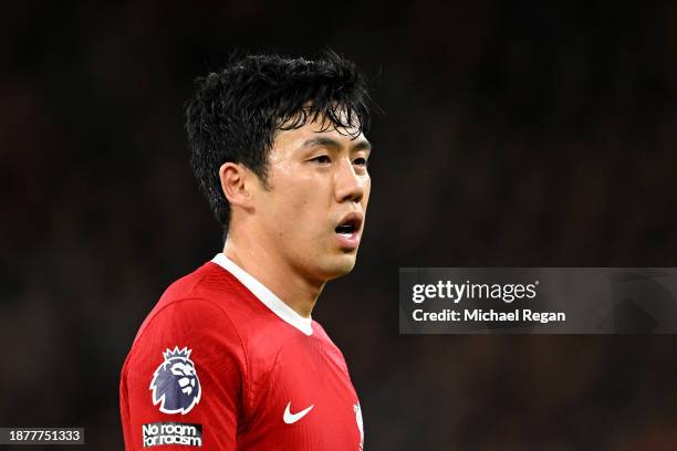 Wataru Endo of Liverpool looks on during the Premier League match between Liverpool FC and Arsenal FC at Anfield on December 23, 2023 in Liverpool,...