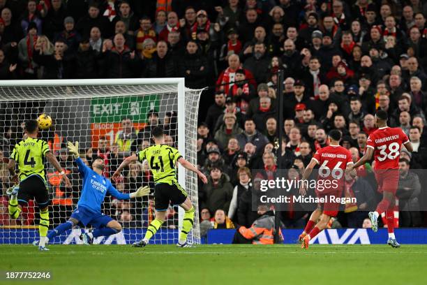 Trent Alexander-Arnold of Liverpool shoots but misses during the Premier League match between Liverpool FC and Arsenal FC at Anfield on December 23,...