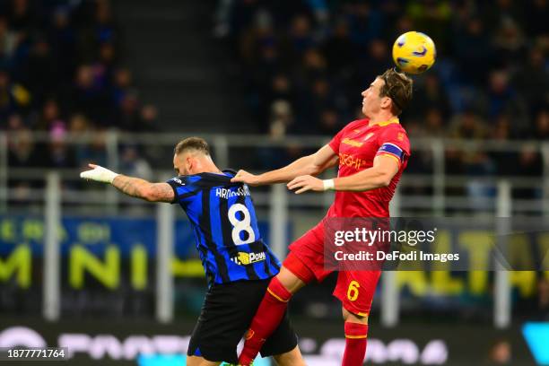 Marko Arnautovic of of FC Internazionale and Federico Baschirotto of US Lecce battle for the ball during the Serie A TIM match between FC...