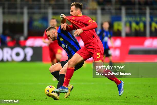 Marko Arnautovic of of FC Internazionale and Marin Pongracic of US Lecce battle for the ball during the Serie A TIM match between FC Internazionale...