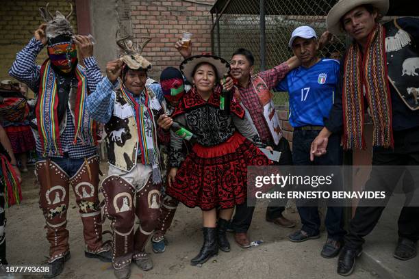 Inhabitants of the province of Chumbivilcas, in Cuzco, southern Peru, pose for a picture during the celebration of Takanakuy in San Juan de...