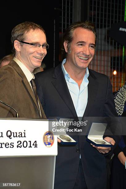 Herve Jourdain, Quai Des Orfevres 2014 award winner for his book 'Le Sang De La Trahison', and Jean Dujardin attend the Quai Des Orfevres 2014...