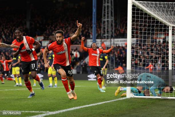 Andros Townsend of Luton Town celebrates after scoring their team's first goal during the Premier League match between Luton Town and Newcastle...