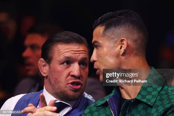 Conor McGregor, Irish Martial Artist and Boxer, and Cristiano Ronaldo, Portuguese football player of Al Nassr, interact during the Day of Reckoning:...