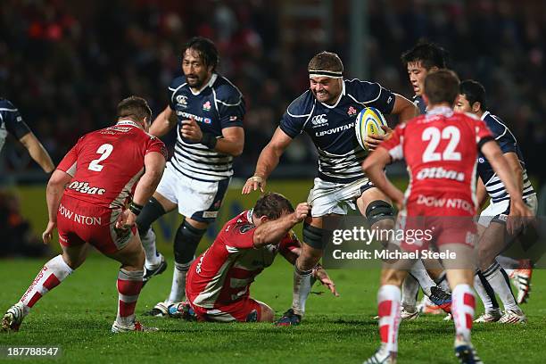 Michael Broadhurst of Japan runs at the Gloucester defence during the International match between Gloucester and Japan at Kingsholm Stadium on...