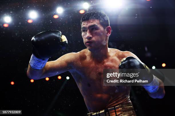 Dmitry Bivol looks on during the IBO and WBA Super World Light Heavyweight title fight between Dmitry Bivol and Lyndon Arthur during the Day of...