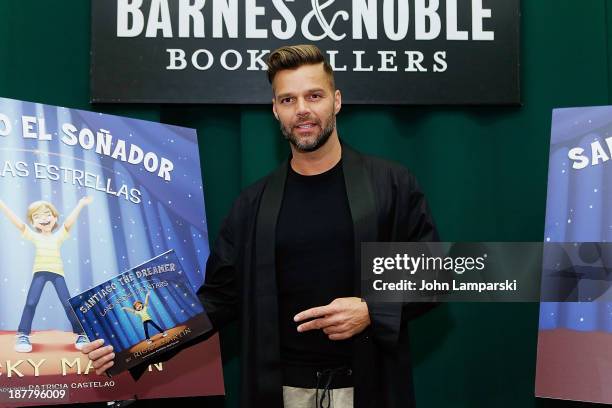 Singer Ricky Martin attends the "Santiago The Dreamer In Land Among The Star" book event at Barnes & Noble Tribeca on November 12, 2013 in New York...