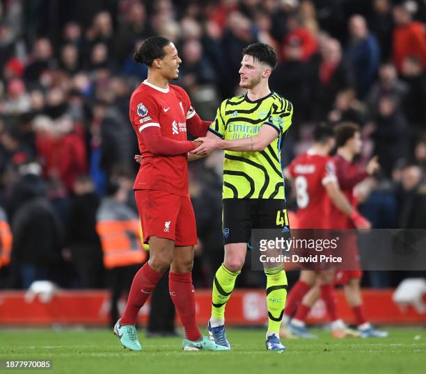 Declan Rice of Arsenal shakes hands with Virgil van Dyke of Liverpool after the Premier League match between Liverpool FC and Arsenal FC at Anfield...