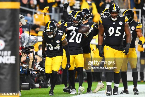 Patrick Peterson of the Pittsburgh Steelers celebrates with teammates after securing an interception during the first quarter of a game against the...