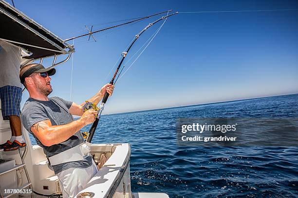 deep sea fisherman - visindustrie stockfoto's en -beelden