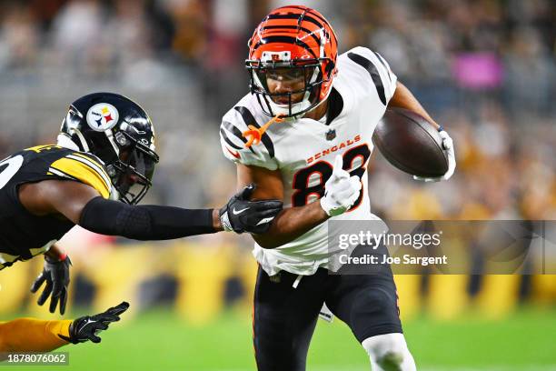 Tyler Boyd of the Cincinnati Bengals runs with the ball during the first quarter of a game against the Pittsburgh Steelers at Acrisure Stadium on...