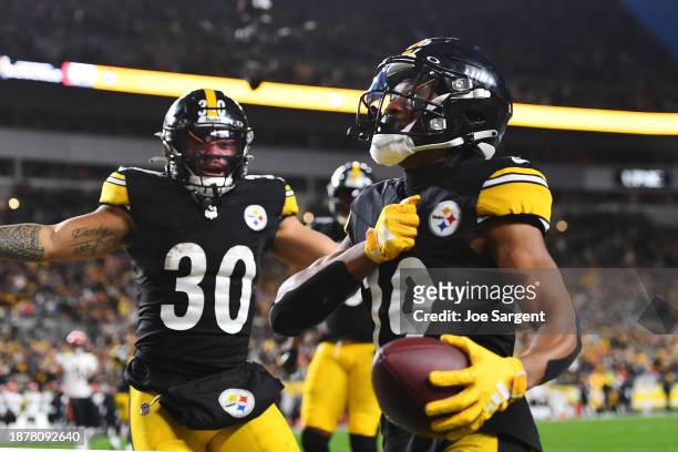 Calvin Austin III of the Pittsburgh Steelers celebrates after scoring a touchdown during the second quarter of a game against the Cincinnati Bengals...
