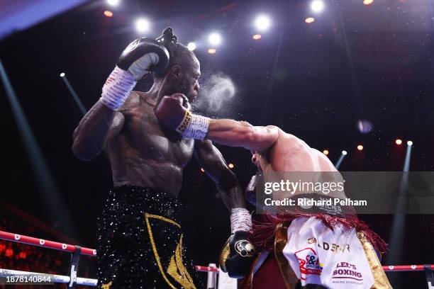 Joseph Parker punches Deontay Wilder during the WBC International & WBO Intercontinental Heavyweight title fight between Deontay Wilder and Joseph...