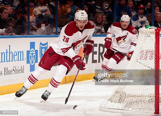 Michael Stone of the Phoenix Coyotes skates against the St. Louis Blues on November 12, 2013 at Scottrade Center in St. Louis, Missouri.