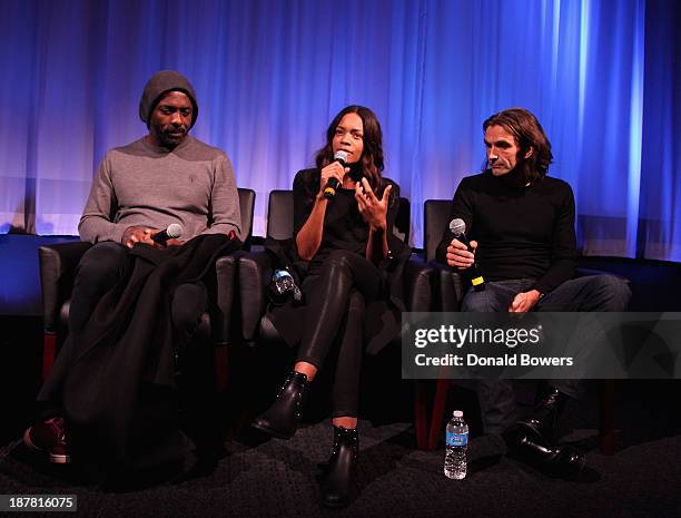 Idris Elba, Naomie Harris and Justin Chadwick attend The Academy Of Motion Picture Arts And Sciences Hosts An Official Academy Members Screening Of...