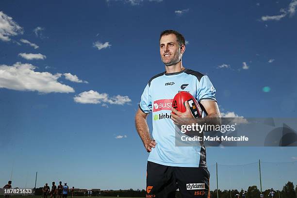 Simon Katich poses during a Greater Western Sydney Giants AFL media opportunity at Sydney Olympic Park on November 13, 2013 in Sydney, Australia.