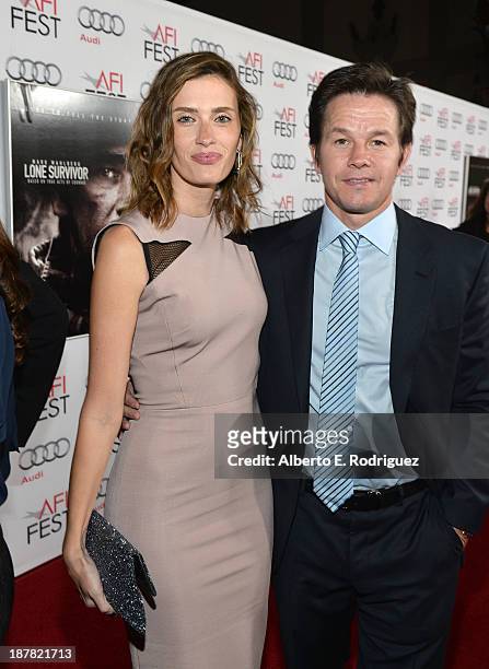 Model Rhea Durham and Actor Mark Wahlberg attend the premiere for "Lone Survivor" during AFI FEST 2013 presented by Audi at TCL Chinese Theatre on...