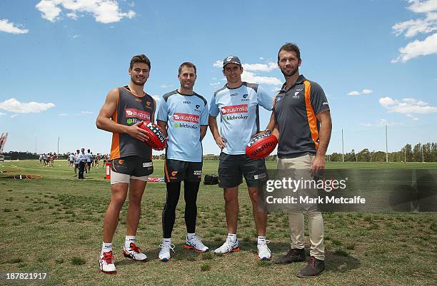 Stephen Coniglio, Simon Katich, Leon Cameron and Mark McVeigh pose during a Greater Western Sydney Giants AFL media opportunity at Sydney Olympic...