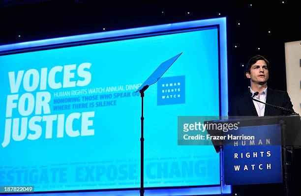 Actor Ashton Kutcher speaks at the Human Rights Watch Voices For Justice Dinner at The Beverly Hilton Hotel on November 12, 2013 in Beverly Hills,...