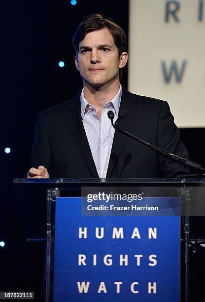 Actor Ashton Kutcher speaks at the Human Rights Watch Voices For Justice Dinner at The Beverly Hilton Hotel on November 12, 2013 in Beverly Hills,...