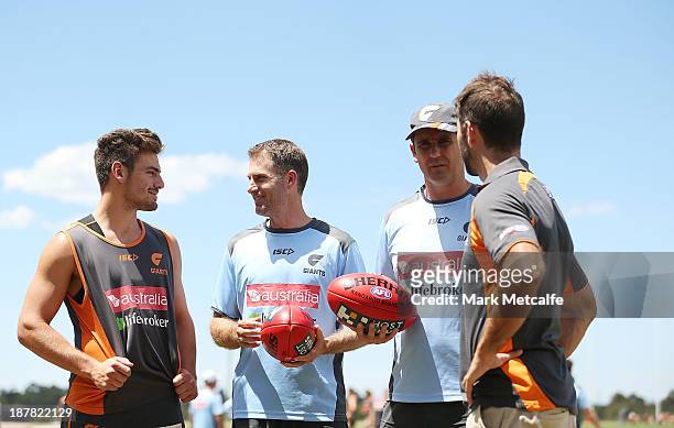Stephen Coniglio, Simon Katich, Leon Cameron and Mark McVeigh pose during a Greater Western Sydney Giants AFL media opportunity at Sydney Olympic...