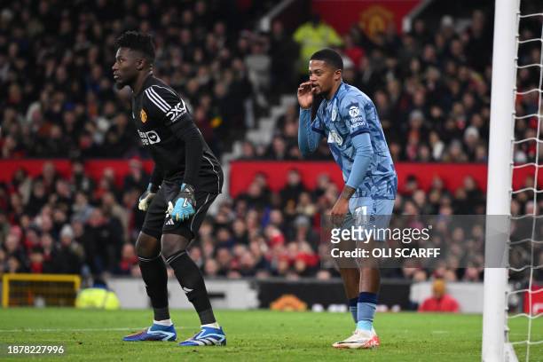 Aston Villa's Jamaican striker Leon Bailey stands in an offside position behind Manchester United's Cameroonian goalkeeper Andre Onana as Aston...