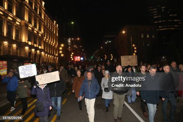 Citizens stage a protest outside the central election commission building to protest election results in Belgrade, Serbia on December 26, 2023.