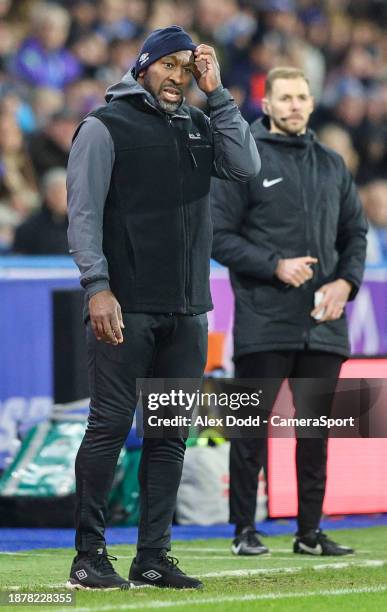 Huddersfield Town manager Darren Moore shouts instructions to his team from the technical area during the Sky Bet Championship match between...