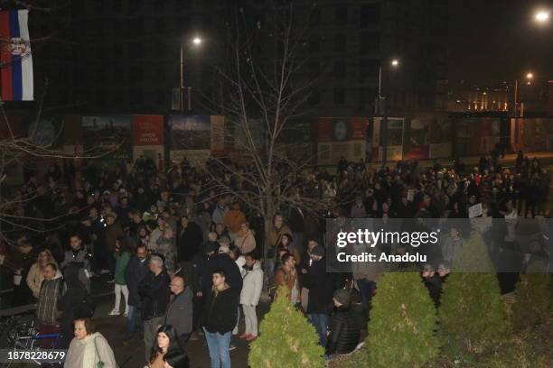 Citizens stage a protest outside the central election commission building to protest election results in Belgrade, Serbia on December 26, 2023.