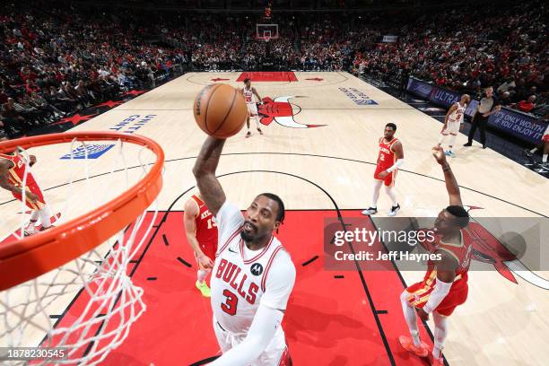 Andre Drummond of the Chicago Bulls dunks the ball during the game against the Atlanta Hawks on December 26, 2023 at United Center in Chicago,...