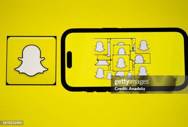 In this photo illustration, logo of Snapchat displayed on a mobile phone screen and computer screen in Ankara, Turkiye on December 26, 2023.