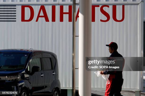 Daihatsu Motors logo is seen at its showroom in Tokyo. Daihatsu Motor Co. Is facing a serious scandal due to misconduct in the automotive...
