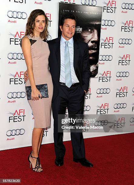 Model Rhea Durham and actor Mark Wahlberg attend the premiere for "Lone Survivor" during AFI FEST 2013 presented by Audi at TCL Chinese Theatre on...